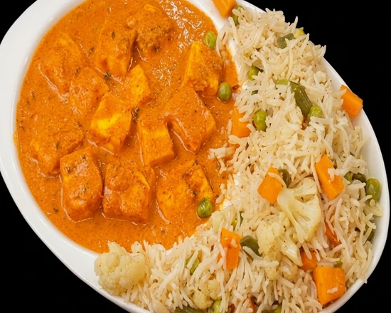 Shahi paneer curry served over basmati rice at Friendz Dhaba Indian restaurant in Brampton