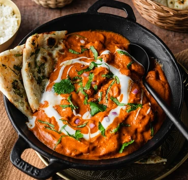 Butter chicken in creamy tomato gravy at Friendz Dhaba, Indian takeout in Brampton