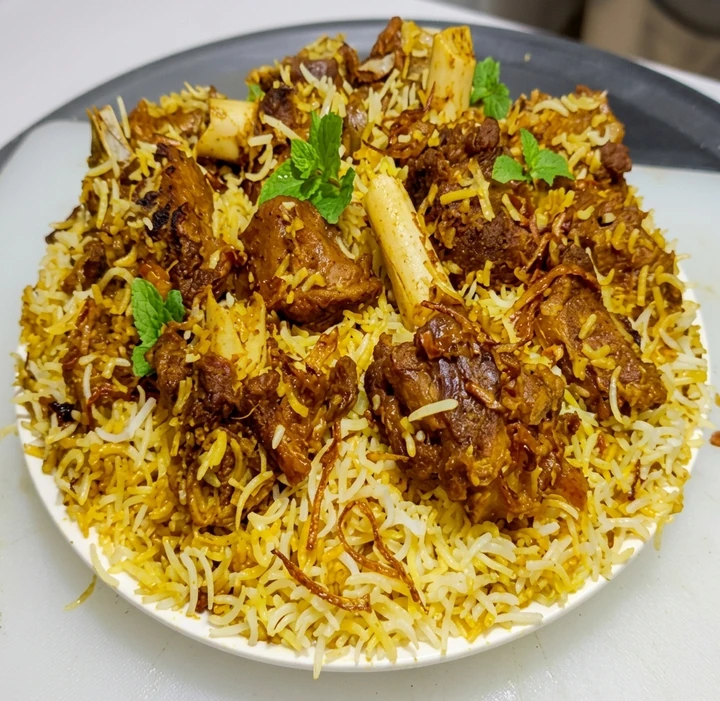 Goat biryani with basmati rice and fried onions at Friendz Dhaba in Brampton